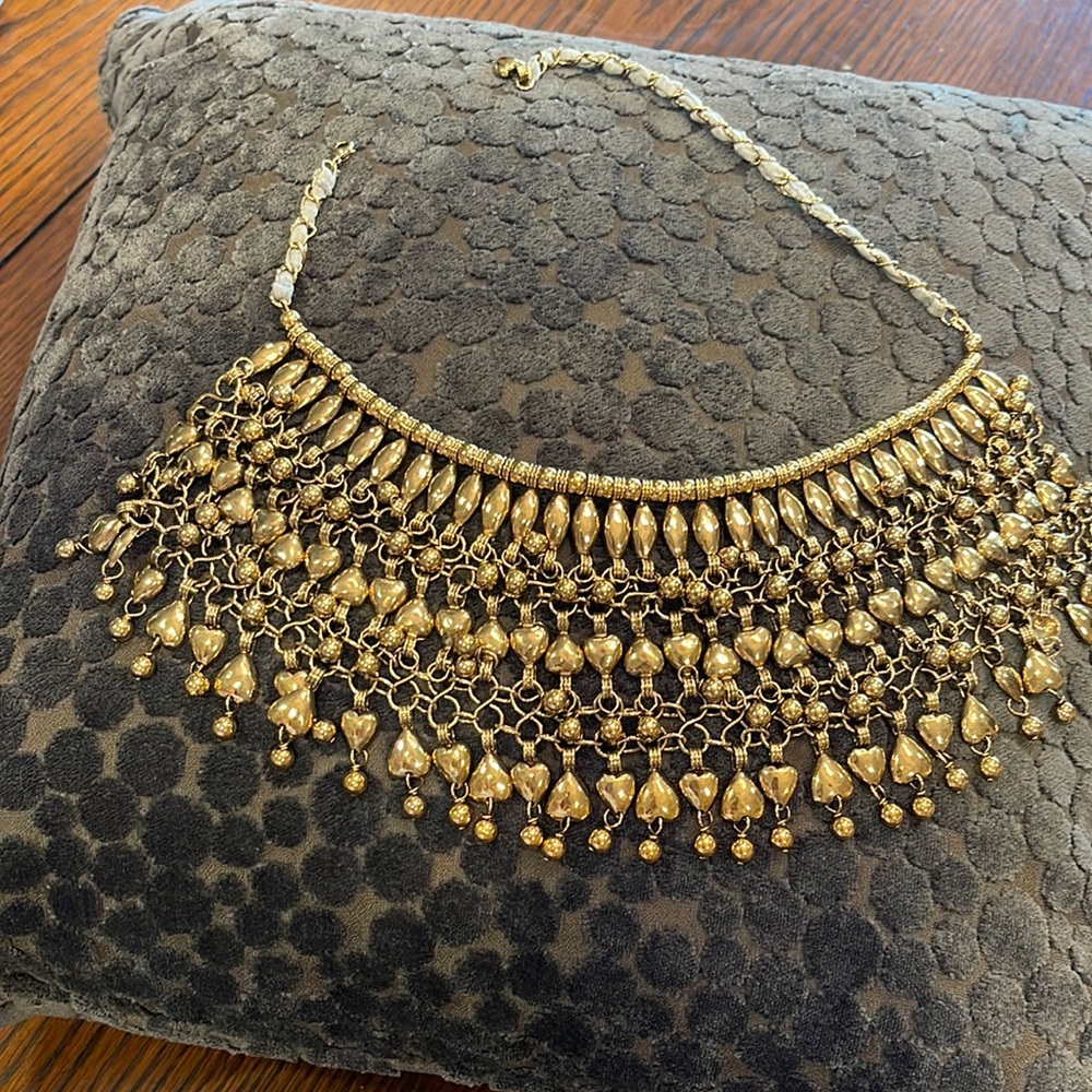 Aurelie Bidermann gold egyptian looking bexnlace hanging heart